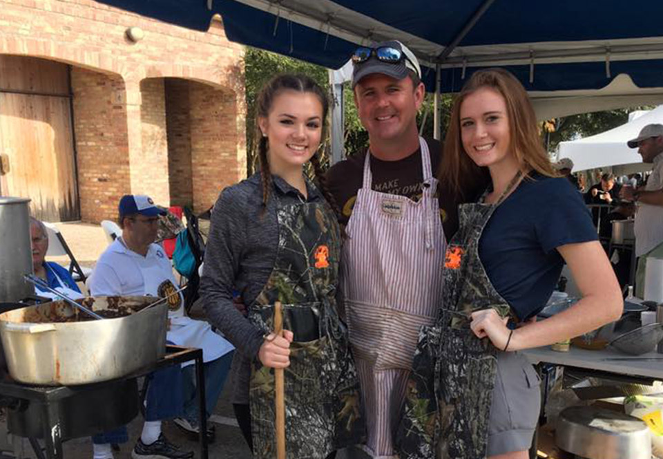 Beau Beaullieu at the New Iberia Gumbo Cook-off with his daughters